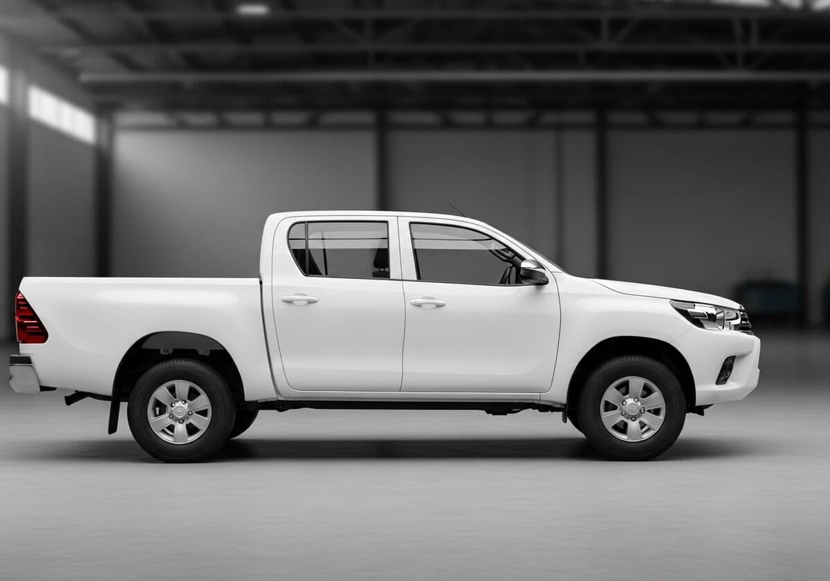 Plain unbranded white Hilux bakkie